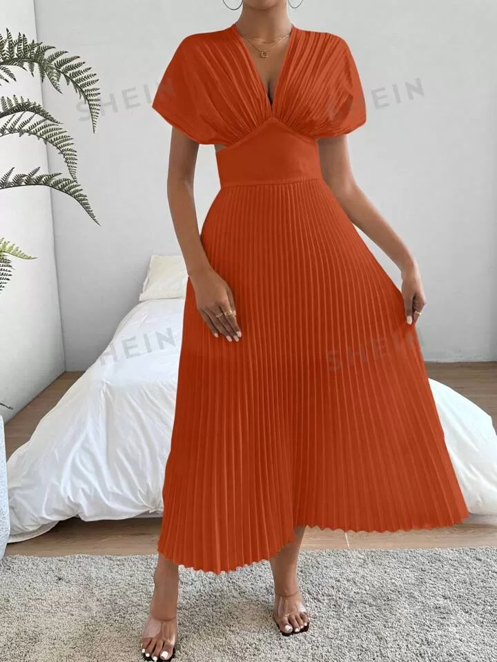 Pleat waist cinched deep v-neck dress in orange